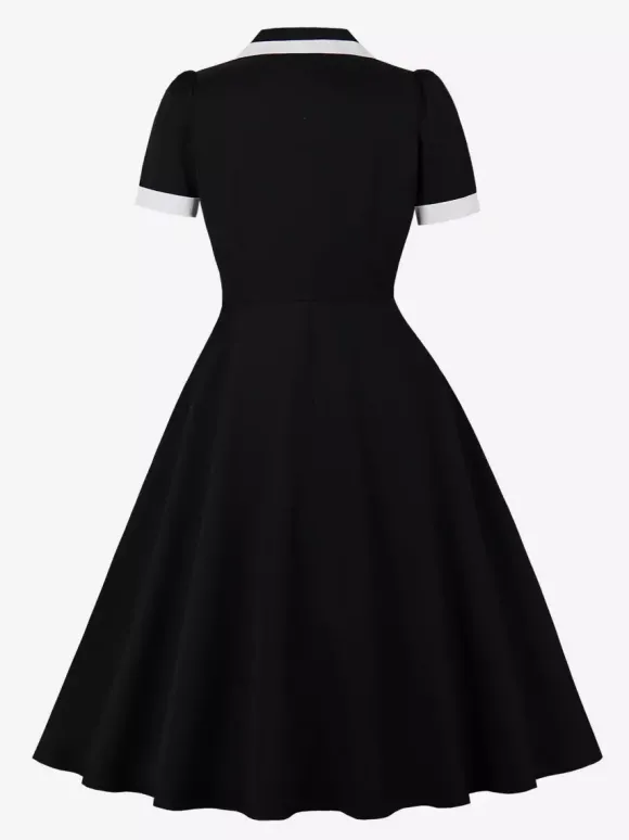Robe rétro trapèze à col à revers contrasté et double poche pour femme (collection 2026)