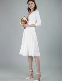 Robes de mariée courtes col en v manches 3/4 longueur longueur genou robe de mariage
