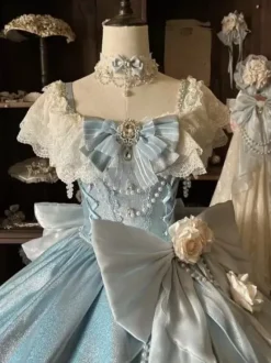 Robes Lolita féeriques bleues à n艙uds fleurs et volants longues robes Lolita en dentelle