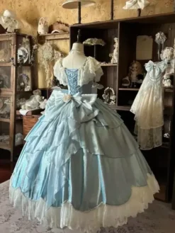 Robes Lolita féeriques bleues à n艙uds fleurs et volants longues robes Lolita en dentelle