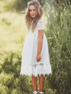 Robes cortège enfant ivoire en tulle col rond en dentelle longueur au dessus de genou robe fille de fleur