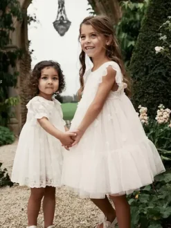 Robes de demoiselle d'honneur blanches en tulle ivoire à manches courtes et col bijou