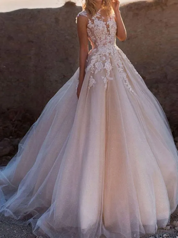 Robes de mariées princesses à traîne en mousselines dos transparent boutonné sur dos Robe mariée vaporeuse