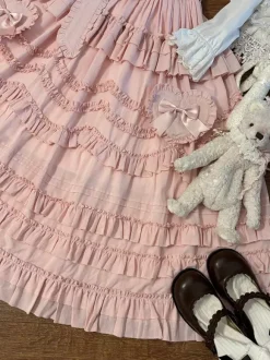 Robe Sweet Lolita avec ceinture en dentelle et volants longueur thé.