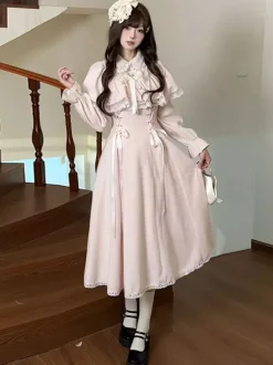 Robe Sweet Lolita rose classique avec fausse cape à deux couches manches longues et n艙uds.