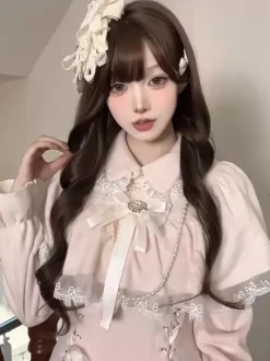 Robe Sweet Lolita rose classique avec fausse cape à deux couches manches longues et n艙uds.
