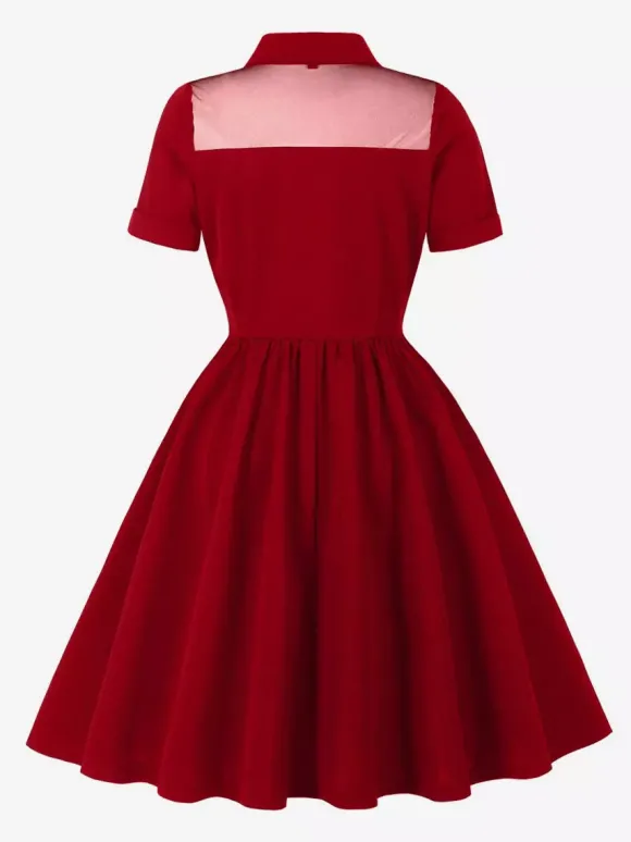 Robe trapèze vintage années 1950 pour femme col contrastant en résille fermeture boutonnée sur le devant
