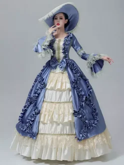 Robe victorienne vintage manches en dentelle volants froncés longueur au sol.