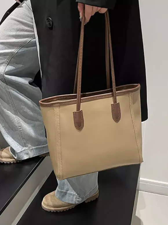 Sac cabas minimaliste en cuir à blocs de couleur grande capacité idéal pour les trajets quotidiens. Sac à bandoulière.
