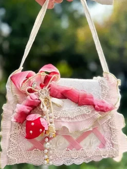 Sac Lolita de style pastoral en polyester rose à volants et chaînes sac à main ombré accessoires Lolita