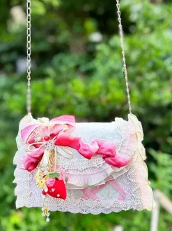 Sac Lolita de style pastoral en polyester rose à volants et chaînes sac à main ombré accessoires Lolita