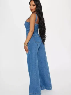 Salopette en jean sexy pour femme - Combinaison rétro bleue à boutons et jambes larges évasées - Tenue streetwear idéale pour les soirées d'été 2026