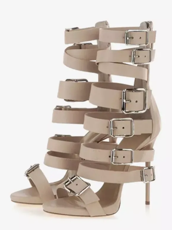 Sandales gladiateur noires à talons hauts et bout ouvert ornées d'une boucle.