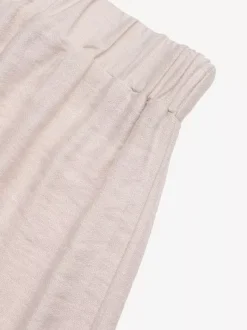 Short beige à taille élastique pour femme avec bordure ondulée noire style décontracté taille haute coupe ample idéal pour l'été.