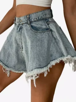 Short en jean taille haute à franges brutes jambes larges coupe trapèze.