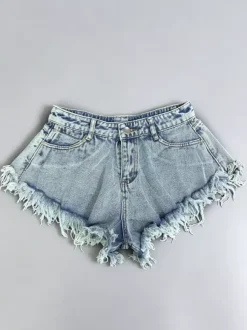 Short en jean taille haute à franges brutes jambes larges coupe trapèze.