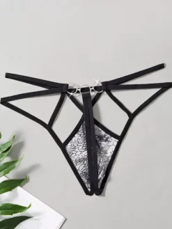 Sous-vêtement string pour homme imprimé serpent taille basse à bretelles.