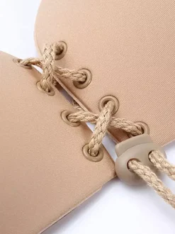 Soutien-gorge invisible en acrylique couleur chair push-up à cordon invisible et ailes de papillon.