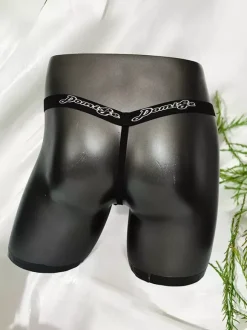 String pour homme en dentelle florale argentée avec poche en maille transparente et sous-vêtement sexy et élastique