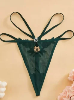 String en dentelle noire lingerie féminine culotte transparente en résille.