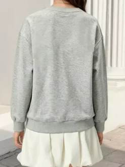 Sweat-shirt oversize à col rond et n艙ud en dentelle poche kangourou manches longues