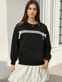 Sweat-shirt oversize à col rond et n艙ud en dentelle poche kangourou manches longues