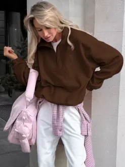 Sweat-shirt doux et duveteux à demi-zip coupe ample poignets côtelés manches longues idéal pour un look décontracté au quotidien.