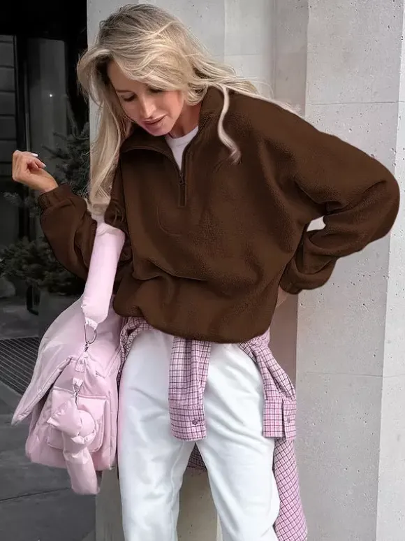 Sweat-shirt doux et duveteux à demi-zip coupe ample poignets côtelés manches longues idéal pour un look décontracté au quotidien.