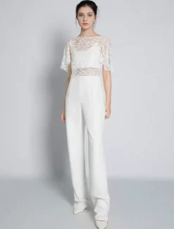 Tenue de mariée deux pièces haut en dentelle dos en V décoré des boutons pantalon en crêpe élastique