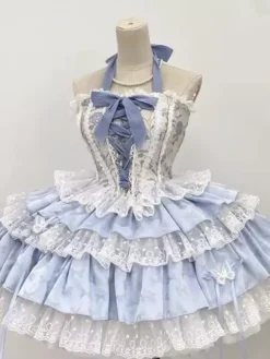 Tenues Sweet Lolita bleu ciel clair à lacets avec n艙uds en dentelle et imprimé floral ensemble haut sans manches et jupe