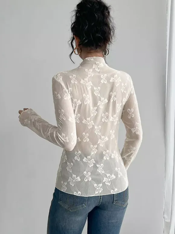 Top à manches longues en maille transparente avec n艙ud intégral jacquard pour femme 2026