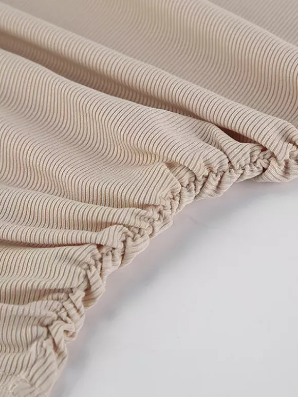 Top beige côtelé à manches longues pour femme - Coupe ajustée manches évasées et froncées sur le devant - Style streetwear minimaliste et basique pour le printemps 2026