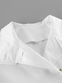 Trench-coat femme en mélange de coton - Coupe oversize minimaliste à double boutonnage et manches larges - Collection printemps-été 2026