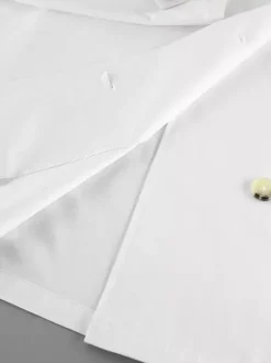 Trench-coat femme en mélange de coton - Coupe oversize minimaliste à double boutonnage et manches larges - Collection printemps-été 2026