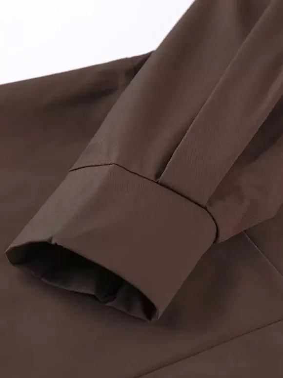 Trench-coat ceinturé pour femme - Col montant chic épaulettes coupe ajustée et péplum - Collection streetwear printemps 2026 au luxe discret