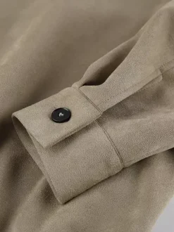 Veste bomber courte décontractée en faux daim pour femme col à revers zippé ourlet côtelé élastique.