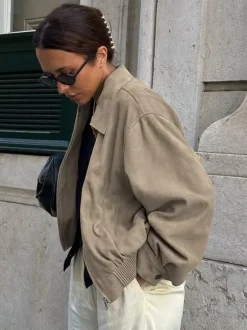 Veste bomber courte décontractée en faux daim pour femme col à revers zippé ourlet côtelé élastique.