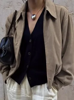 Veste bomber courte décontractée en faux daim pour femme col à revers zippé ourlet côtelé élastique.