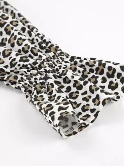 Veste femme à col rabattu boutons imprimé léopard manches longues